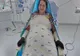 LAVINIA VLAD, PACIENTA CU ARSURI TRANSFERATĂ ÎN BELGIA, A REUȘIT SĂ STEA ÎN FOTOLIU CU AJUTORUL UNUI ROBOT